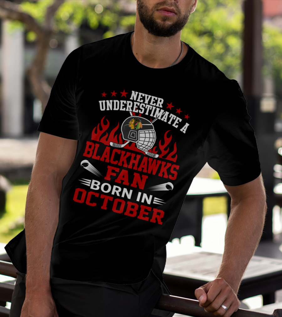 Never Underestimate A Blackhawks Fan Born In October Helmet And Flames Highlighted T-Shirt