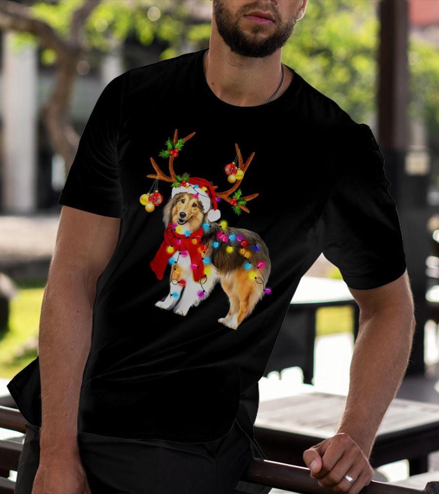 Christmas Sheltie Dog In Santa Hat With Reindeer Antlers And Colorful String Lights T-Shirt