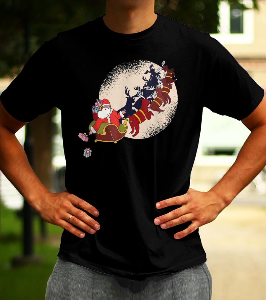 Santa Claus Flying With Reindeers Silhouette Under Full Moon Carrying Gift Sack T-Shirt