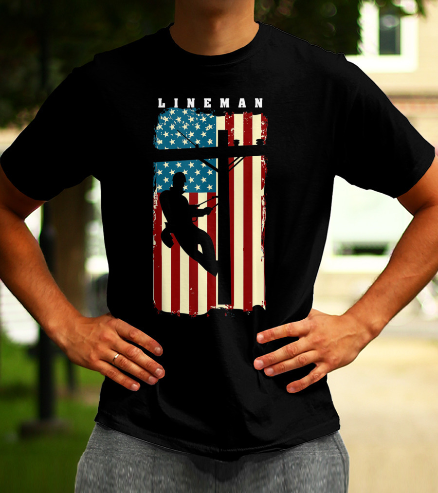 Lineman Silhouette Against American Flag Background With Electric Cable Pole T-Shirt