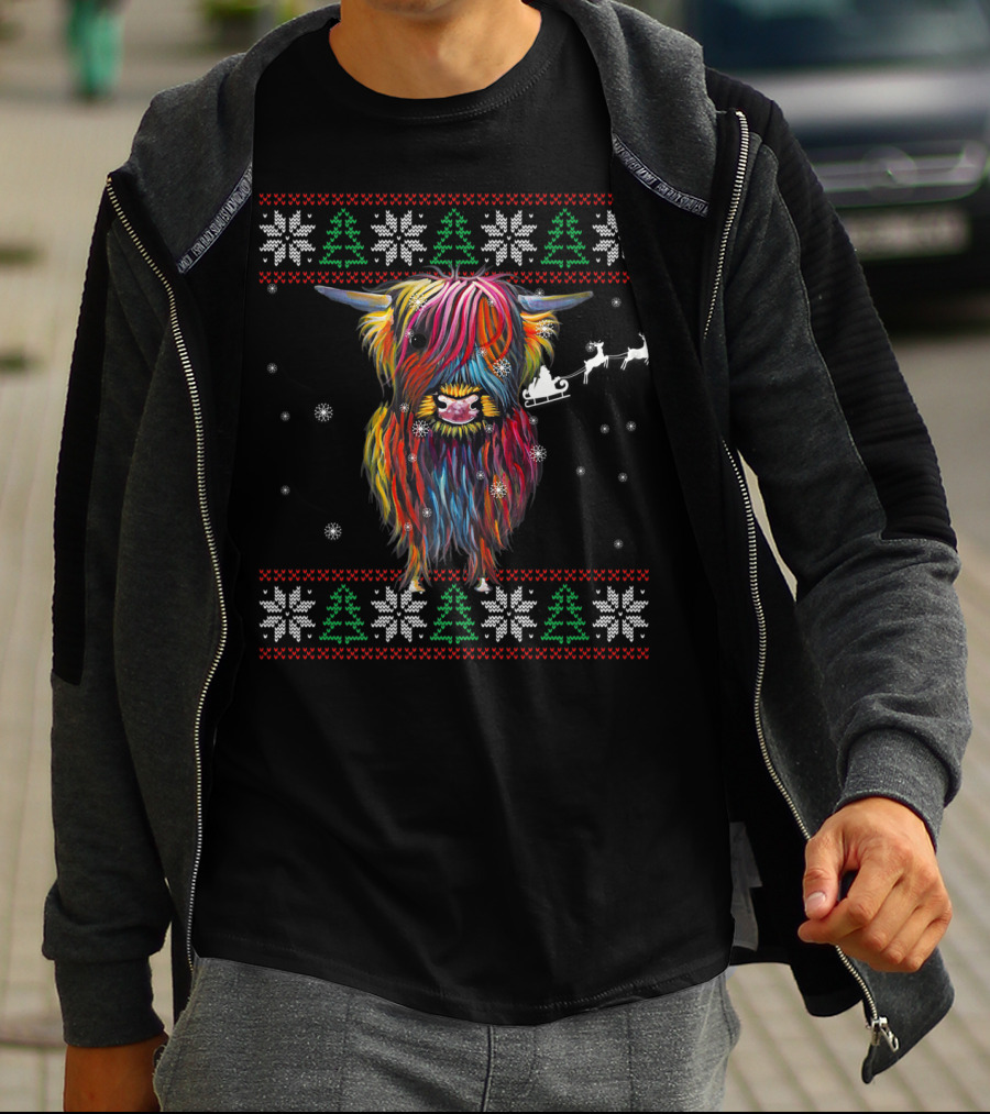 Festive Rainbow Highland Cow With Santa Sleigh And Snowflakes Christmas T-Shirt