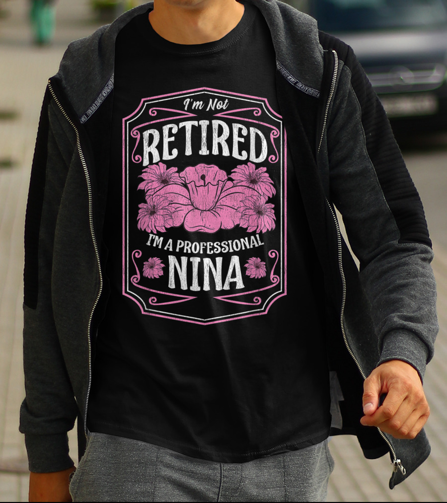 I'm Not Retired I'm A Professional Nina With Floral Accents And Pink Highlights T-Shirt