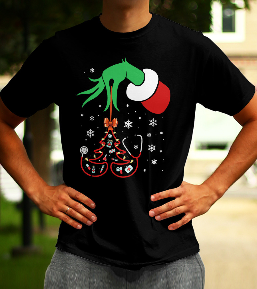 Grinch Hand Holding Nurse Themed Christmas Tree With Medical Icons T-Shirt