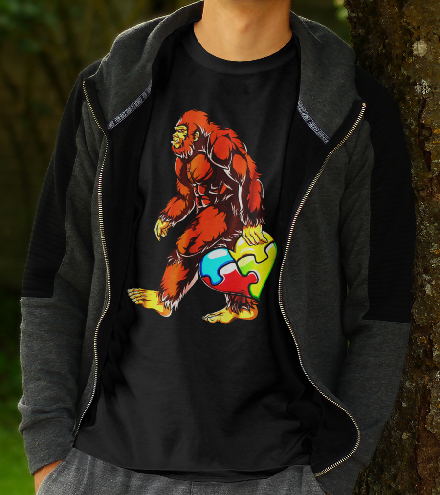 Bigfoot Holding Heart-Shaped Puzzle Piece For Autism Awareness T-Shirt