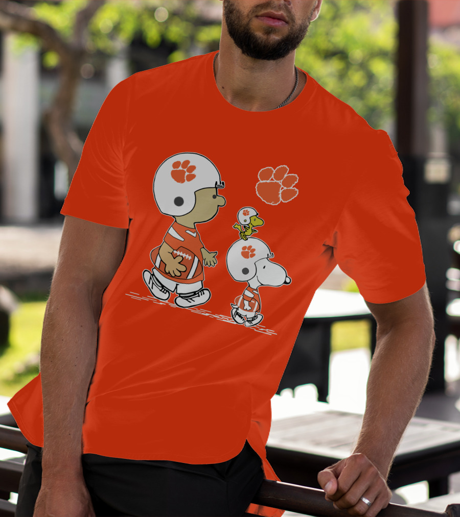 Clemson Tigers Snoopy Football Helmets And Paw Print Charlie Brown Woodstock T-Shirt