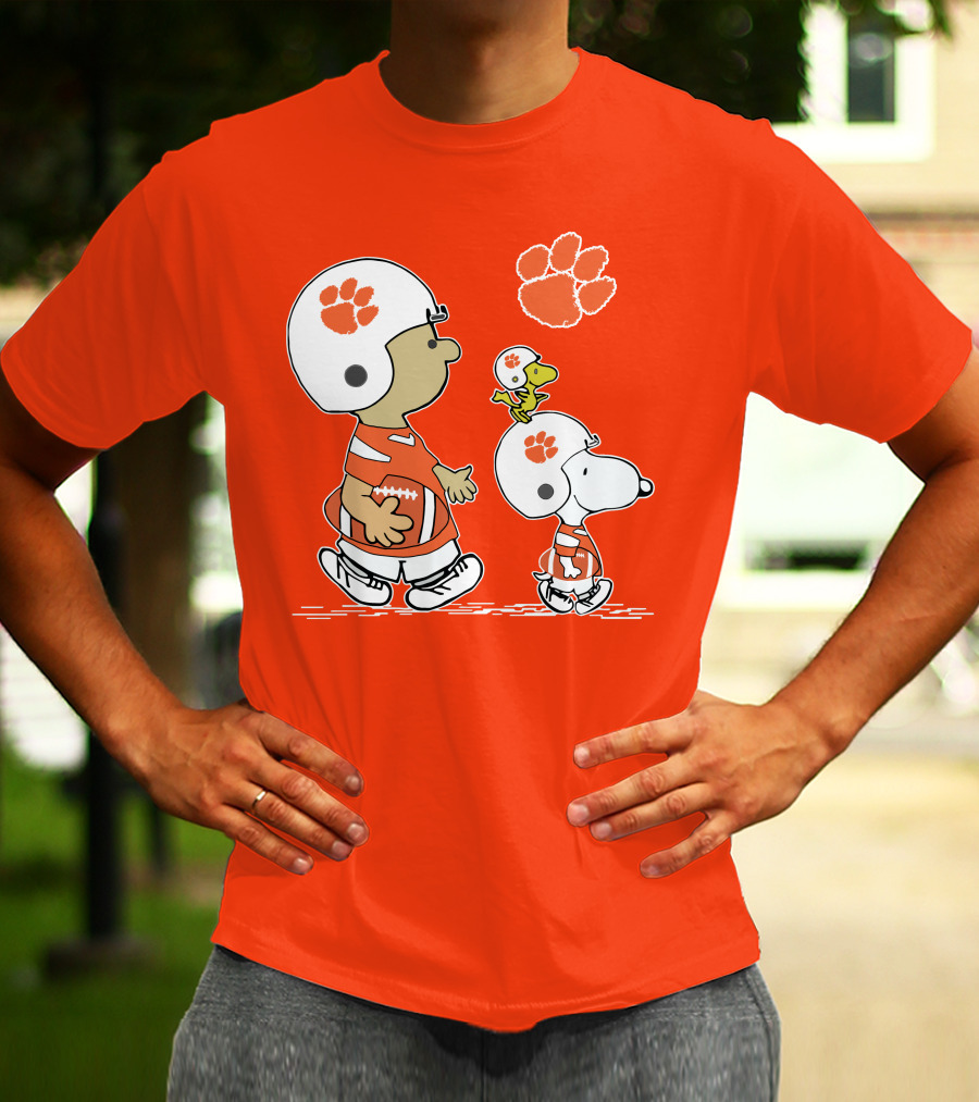 Clemson Tigers Snoopy Football Helmets And Paw Print Charlie Brown Woodstock T-Shirt