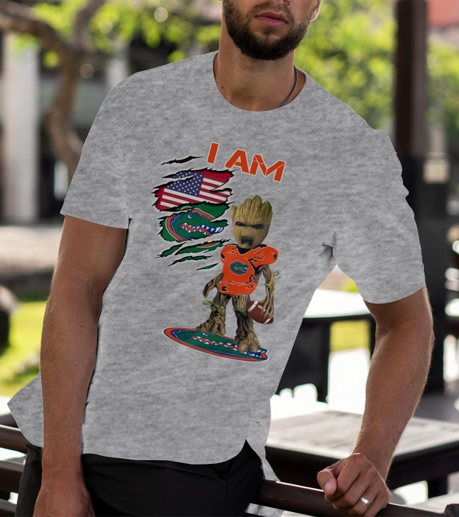 I Am Gators Baby Groot Holding Football With American Flag And Florida Gators T-Shirt