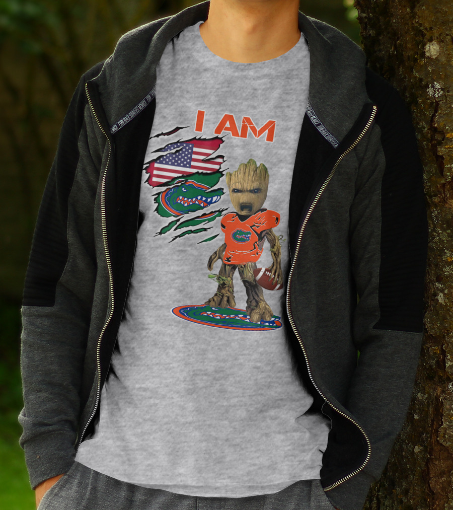 I Am Gators Baby Groot Holding Football With American Flag And Florida Gators T-Shirt