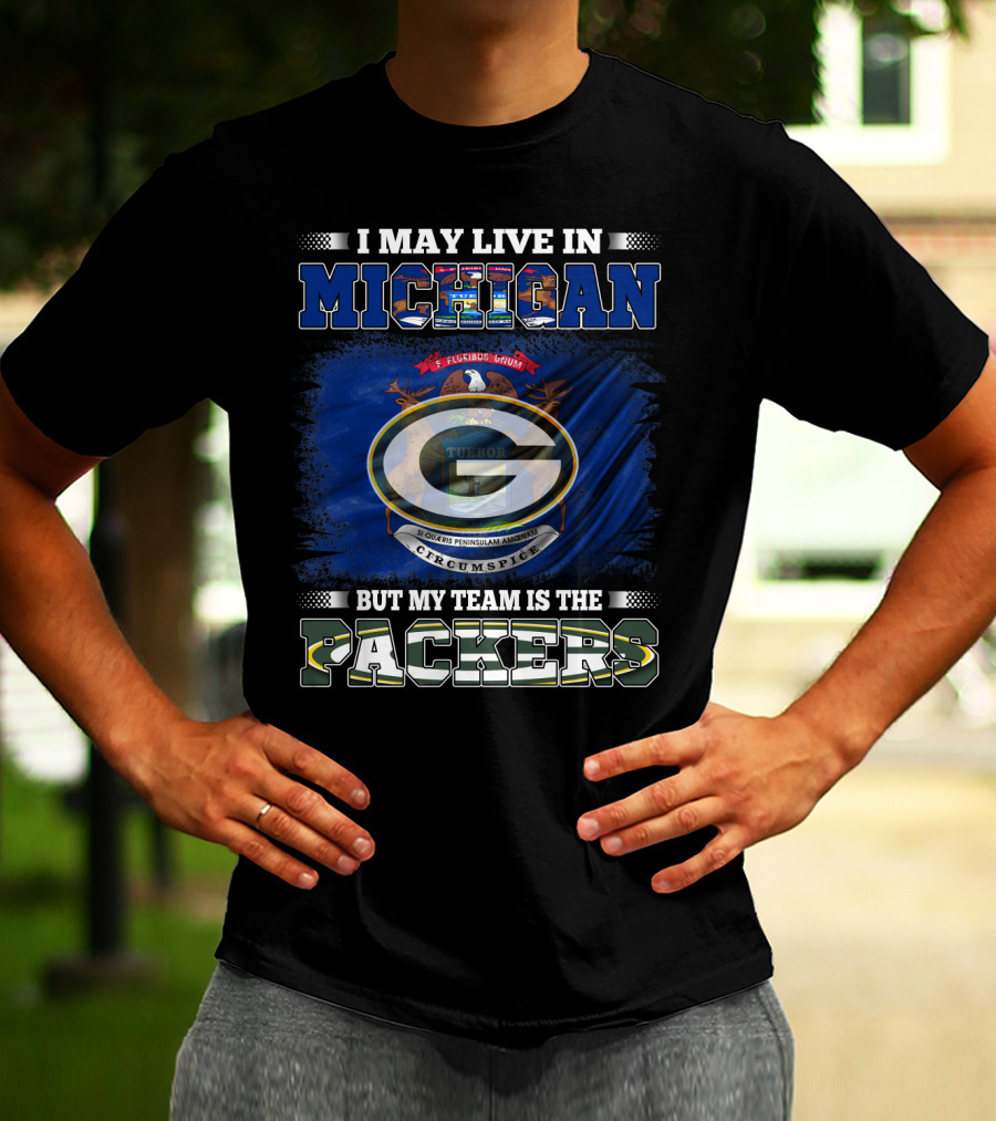 I May Live In Michigan But My Team Is The Packers With Michigan State Seal And Iconic Green G T-Shirt