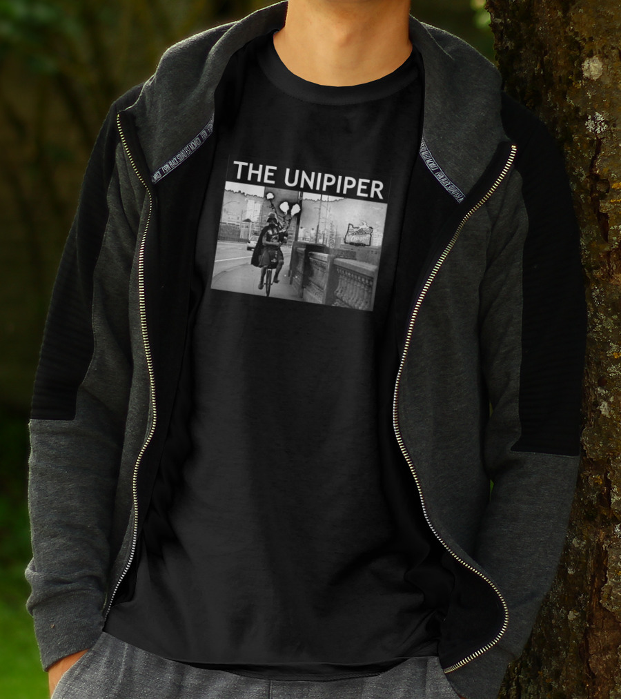 The Unipiper Cycling In Portland Oregon With Bagpipes And Cape T-Shirt