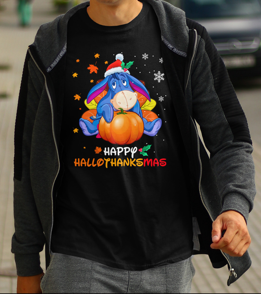 Eeyore Happy Hallothanksmas Sitting On Pumpkin With Santa Hat Snowflakes And Autumn Leaves T-Shirt