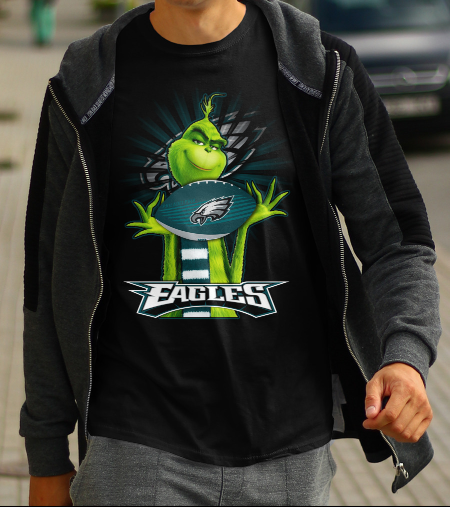 Grinch Holding Philadelphia Eagles Football With Team T-Shirt