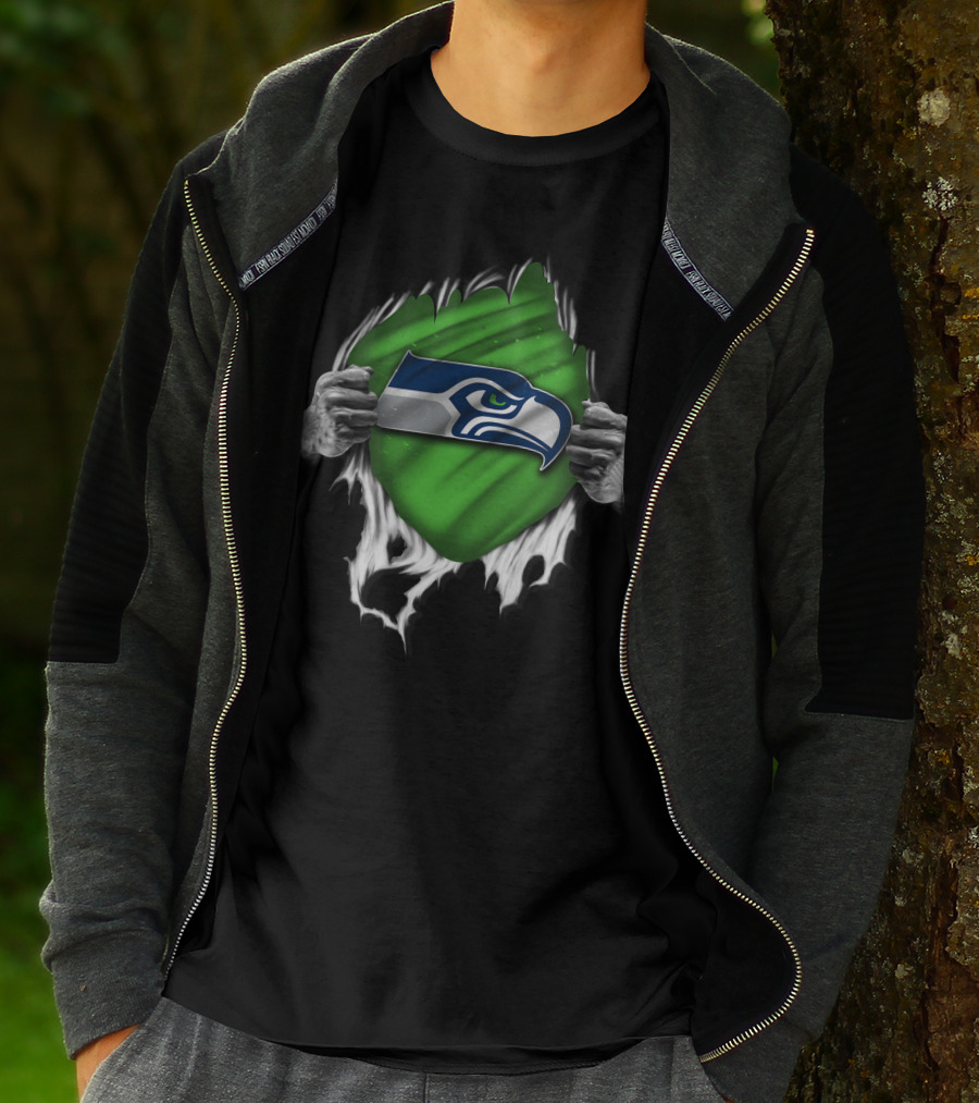 Torn Seattle Seahawks Logo With Green Background And Hands Peeling Fabric T-Shirt