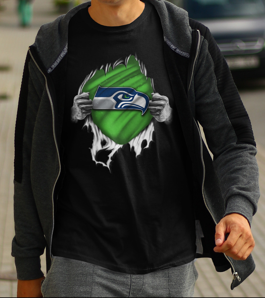 Torn Seattle Seahawks Logo With Green Background And Hands Peeling Fabric T-Shirt