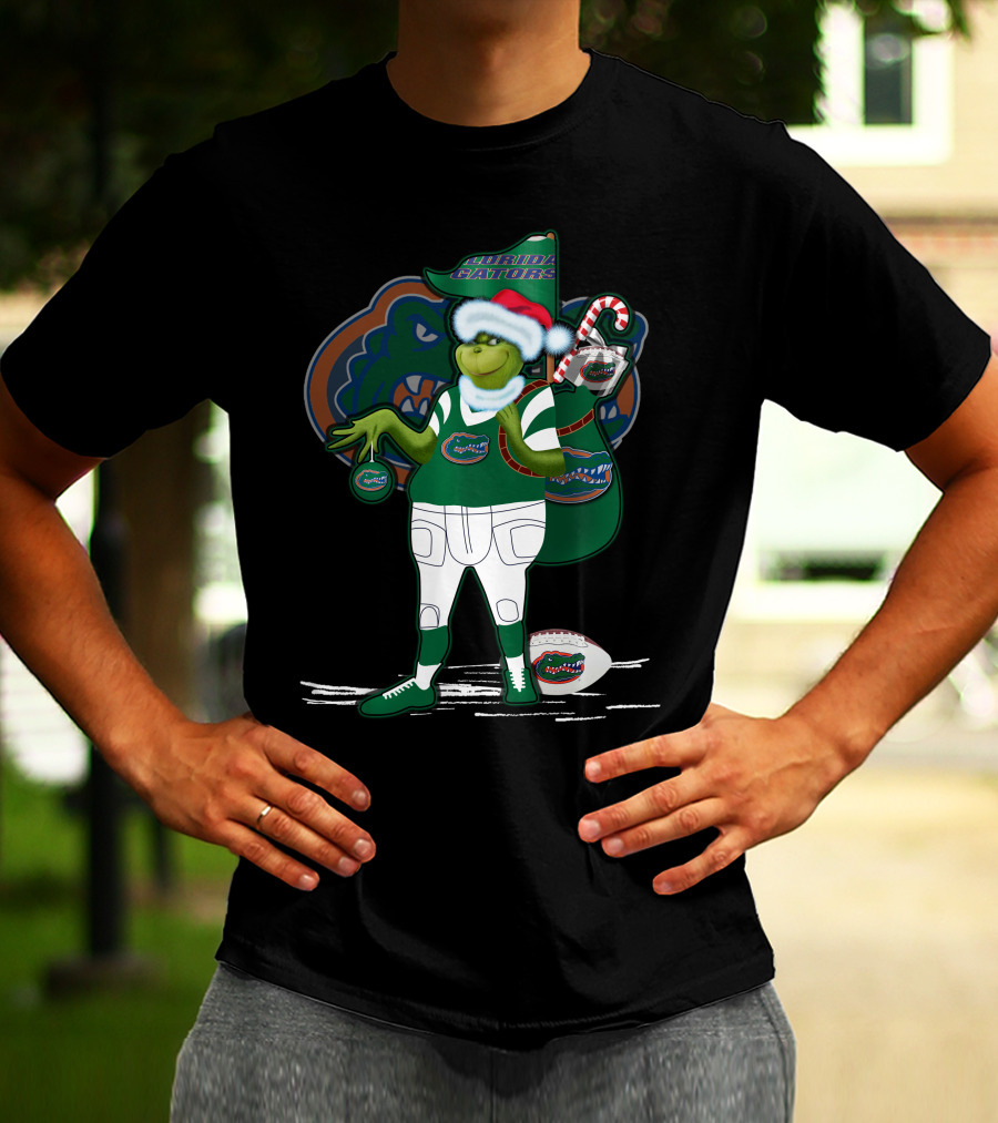Grinchxmas Wearing Santa Hat Florida Gators With Gator Logo And Candy Cane T-Shirt