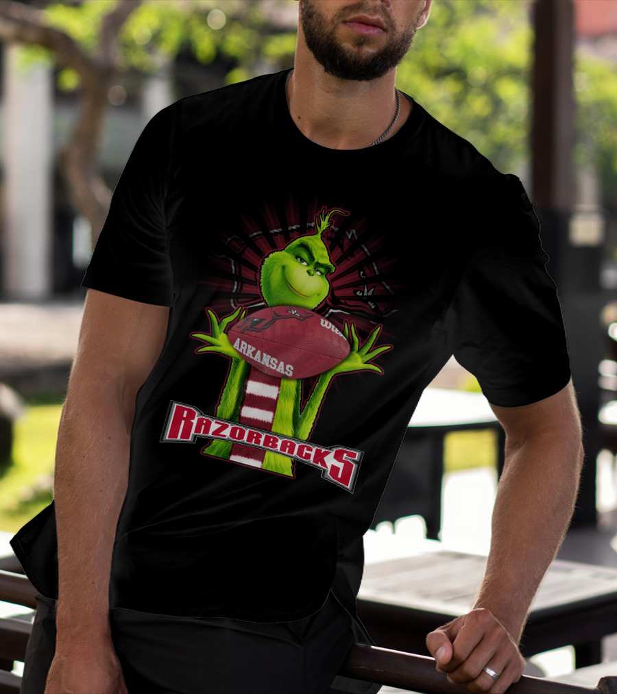 Grinch Holding Arkansas Razorbacks Football T-Shirt