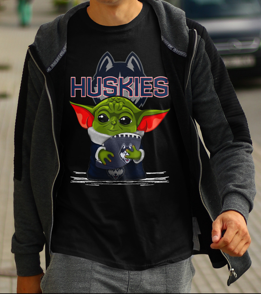 Huskies Yoda Holding Football With Connecticut Logo And Baby Yoda Character T-Shirt