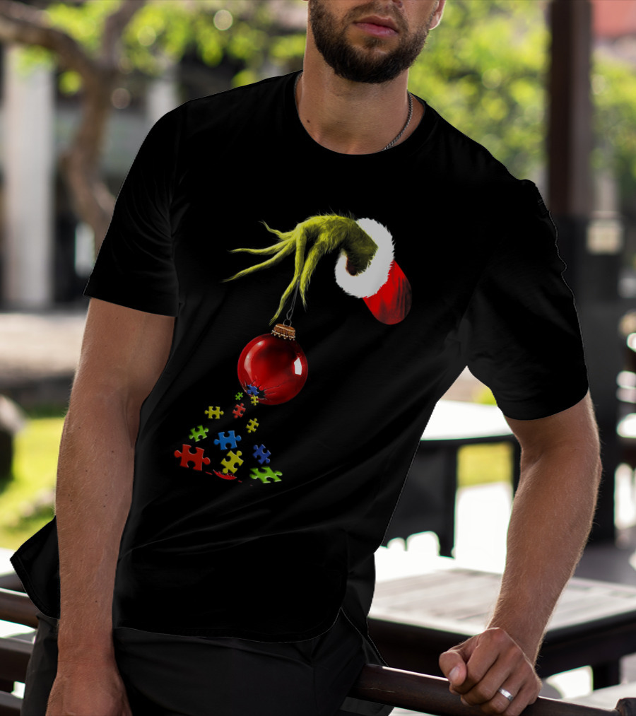 Grinch Hand Holding Red Ornament With Autism Puzzle Pieces T-Shirt