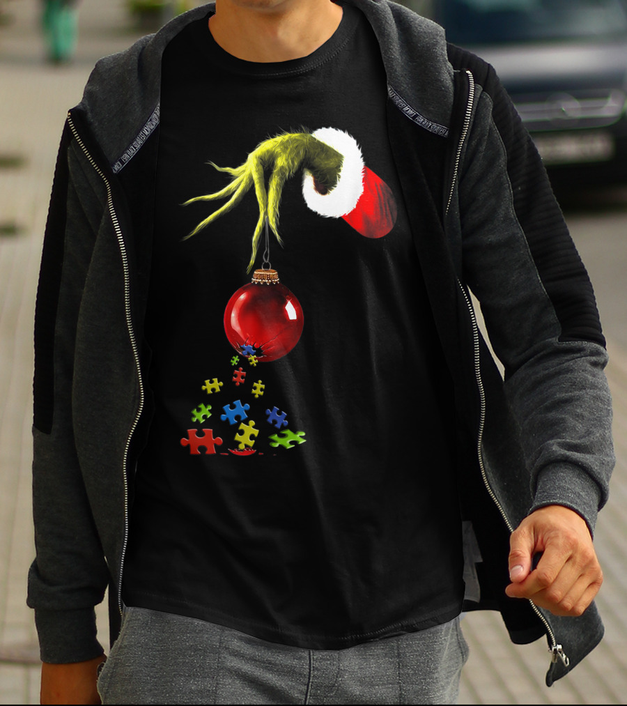 Grinch Hand Holding Red Ornament With Autism Puzzle Pieces T-Shirt