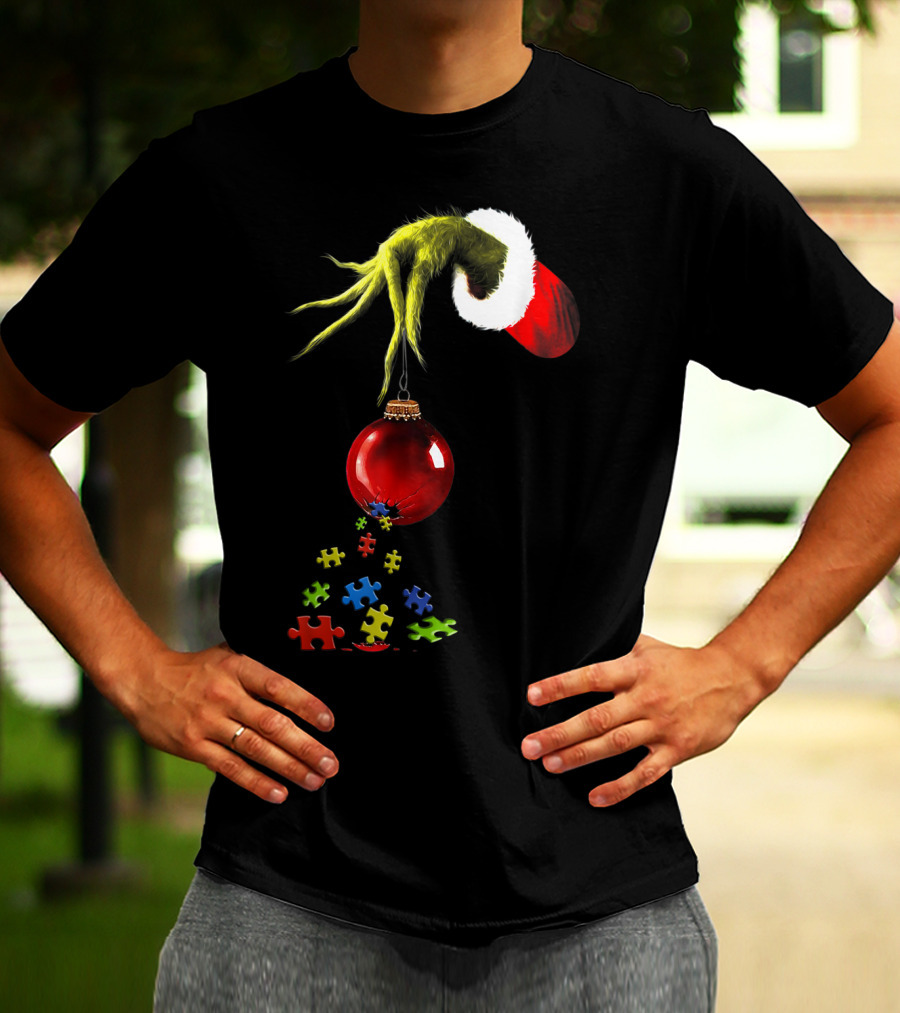 Grinch Hand Holding Red Ornament With Autism Puzzle Pieces T-Shirt