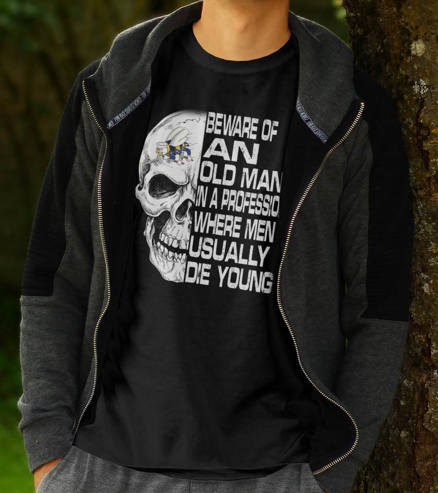Beware Of An Old Man In A Profession Where Men Usually Die Young Skull With Cap And Glasses T-Shirt