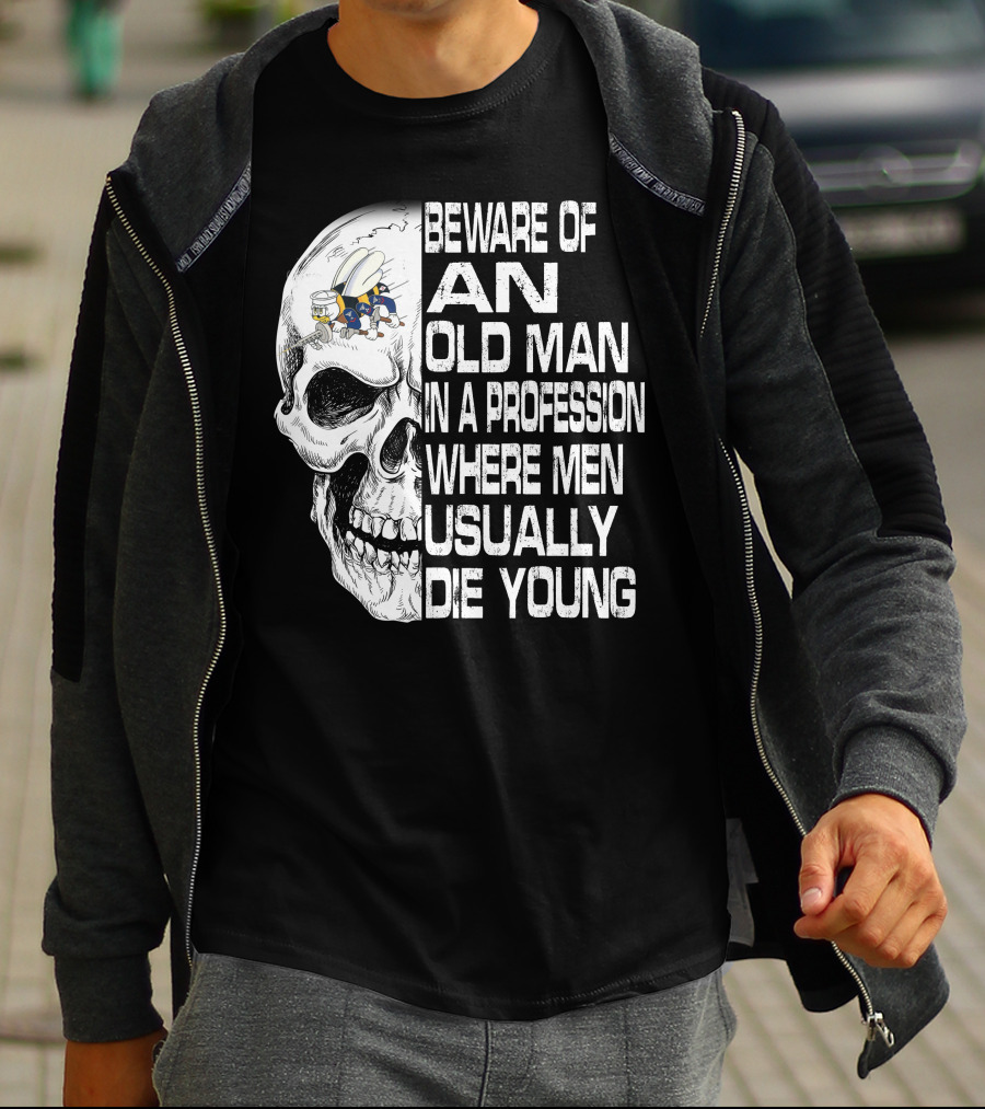 Beware Of An Old Man In A Profession Where Men Usually Die Young Skull With Cap And Glasses T-Shirt