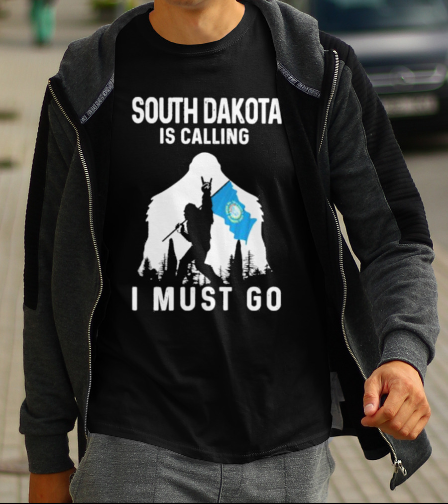 South Dakota Is Calling I Must Go Bigfoot Holding South Dakota Flag T-Shirt