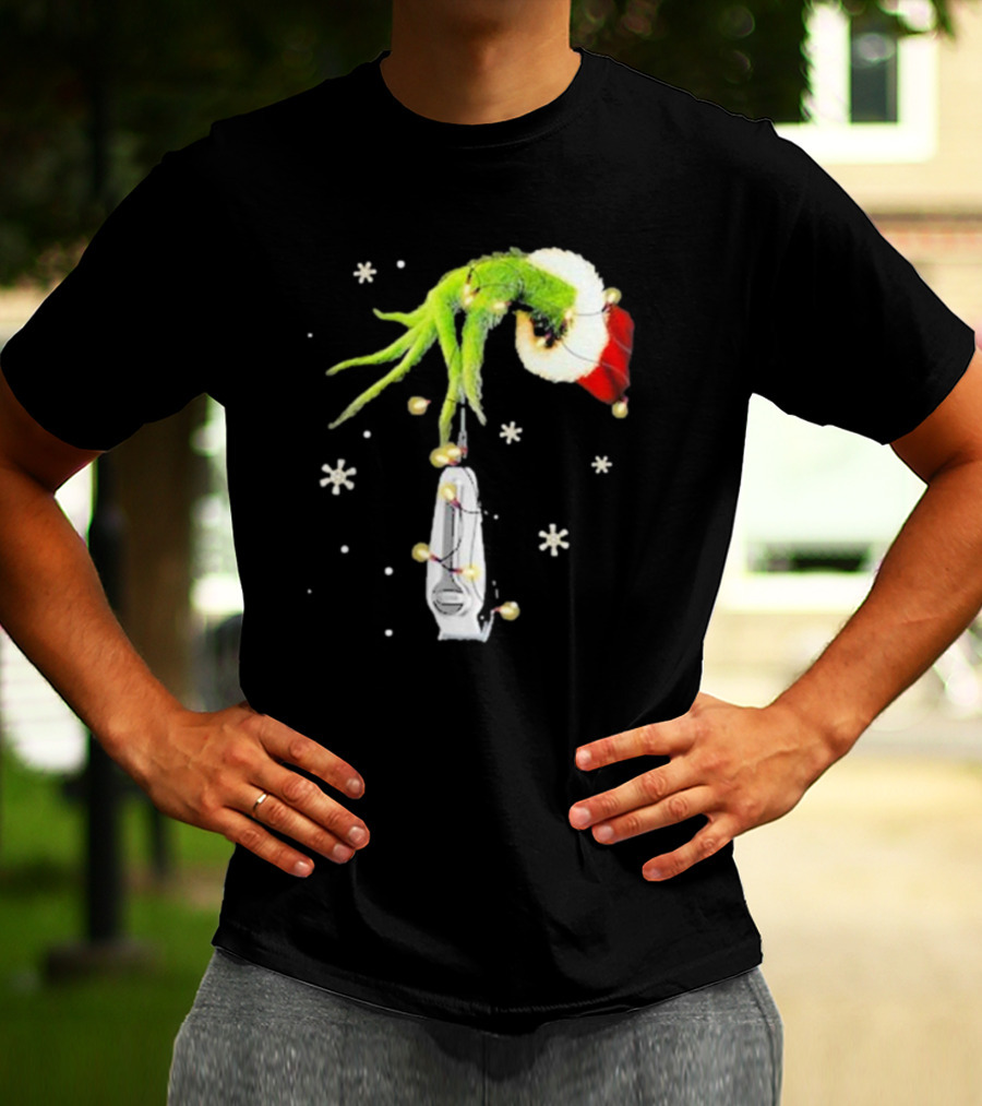 Grinch Christmas Hand Holding Clipper Snowflakes Santa Hat T-Shirt