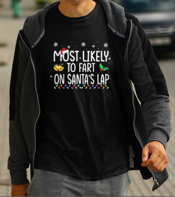 Most Likely To Fart On Santa’s Lap Christmas Holiday Family Humor Santa Hat Snowflakes Lights T-Shirt