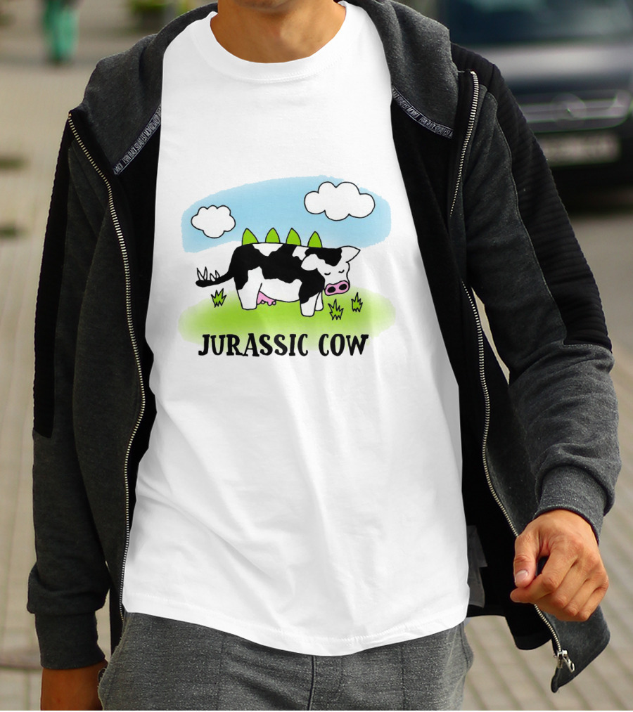 Jurassic Cow Grazing With Dinosaur Spikes Under Blue Sky And Clouds In Cartoon T-Shirt