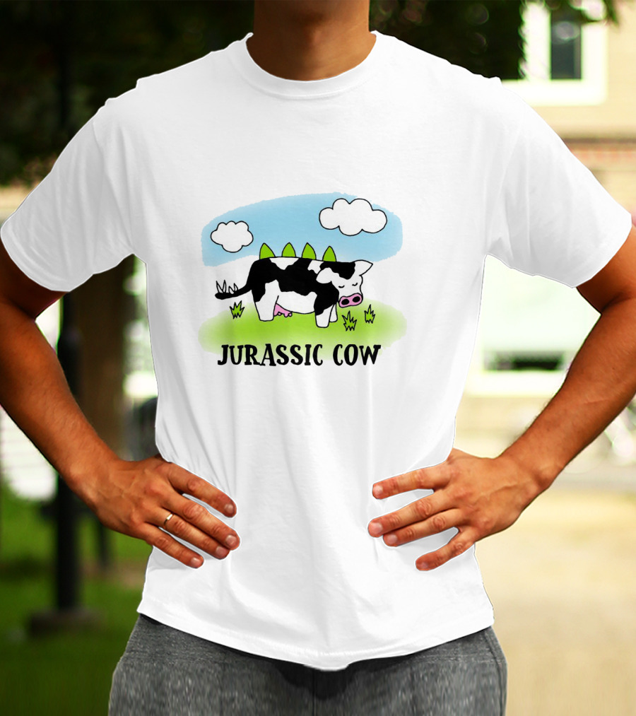 Jurassic Cow Grazing With Dinosaur Spikes Under Blue Sky And Clouds In Cartoon T-Shirt