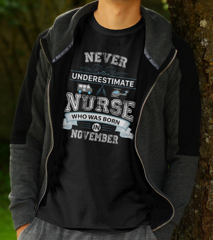 Never Underestimate A Nurse Born In November With Ambulance And Helicopter Elements T-Shirt