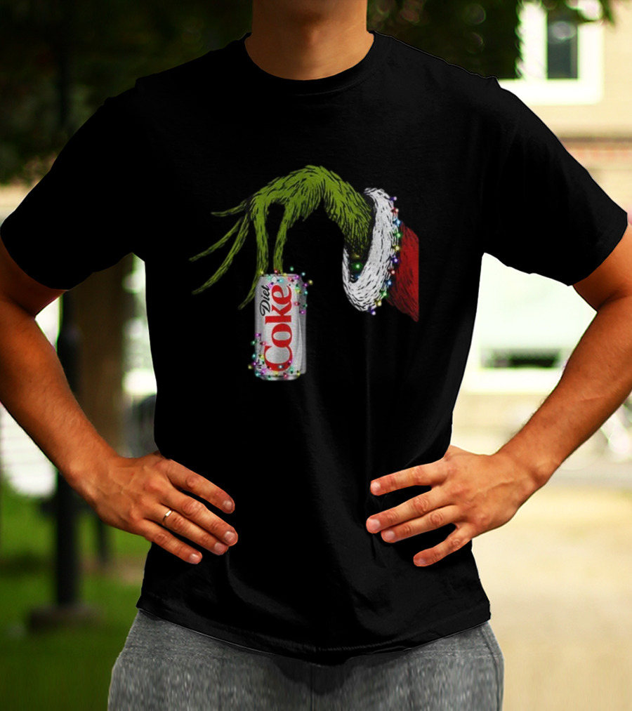 Grinch Hand Holding Diet Coke Can Wrapped In Christmas Lights Merry Christmas T-Shirt