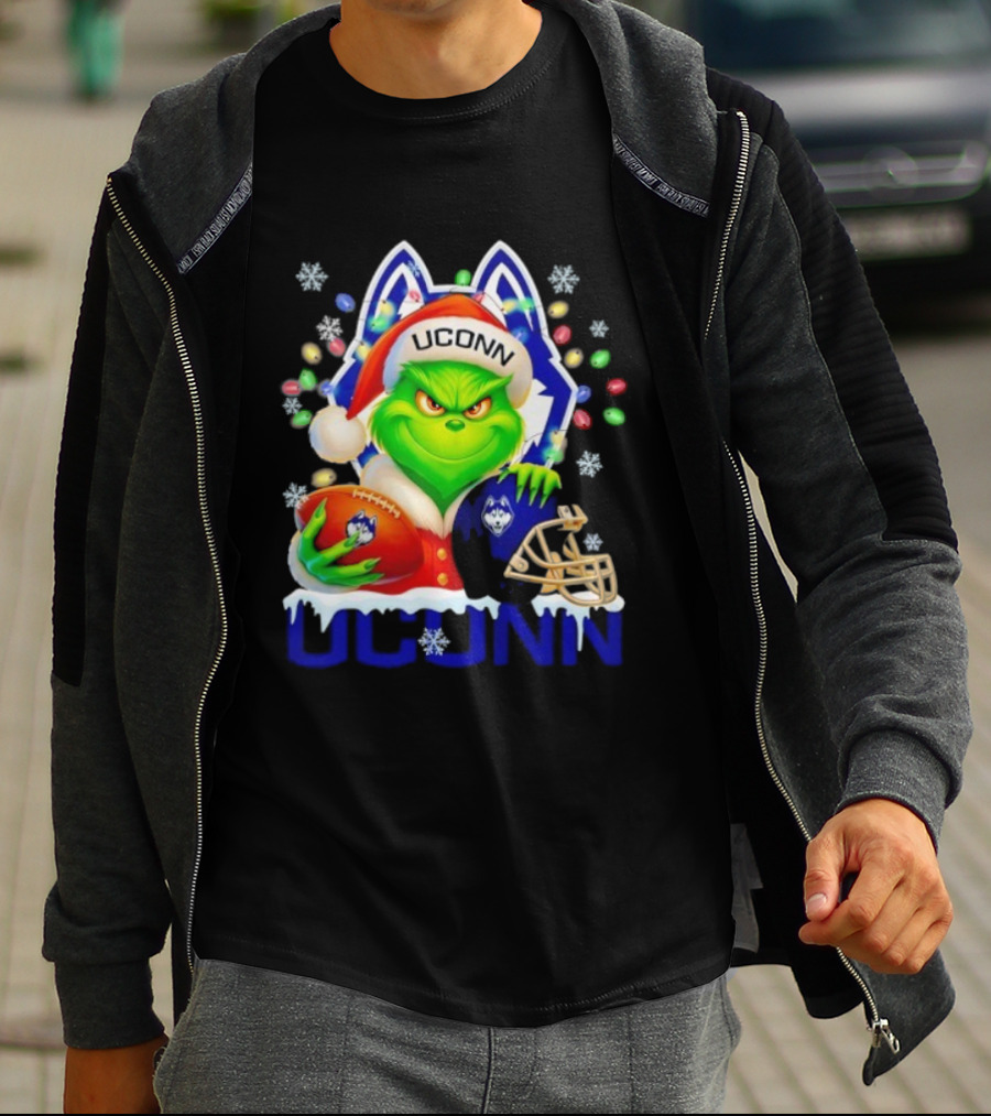 Grinch Wearing Santa Hat With UConn Huskies Football And Helmet Merry Christmas T-Shirt