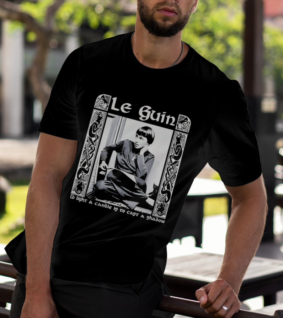 Le Guin To Light A Candle Is To Cast A Shadow T-Shirt