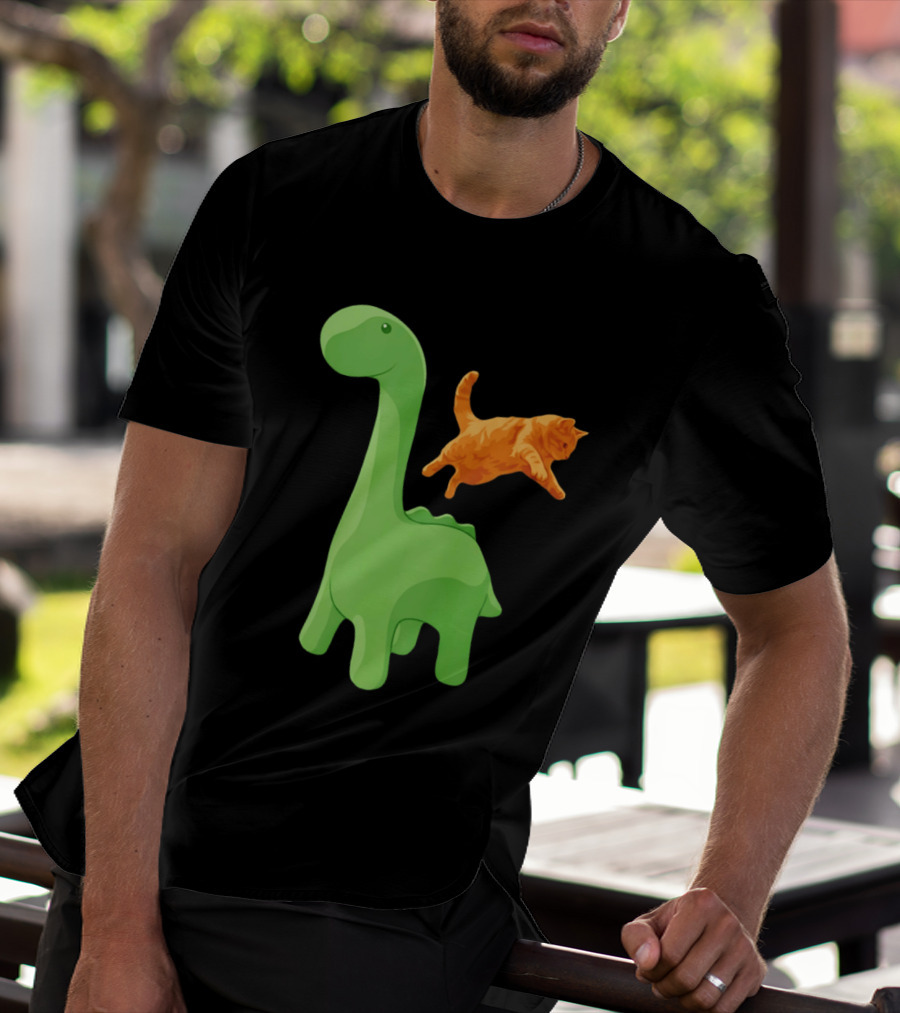 Cat Jumping Over Green Dinosaur Cartoon Image T-Shirt