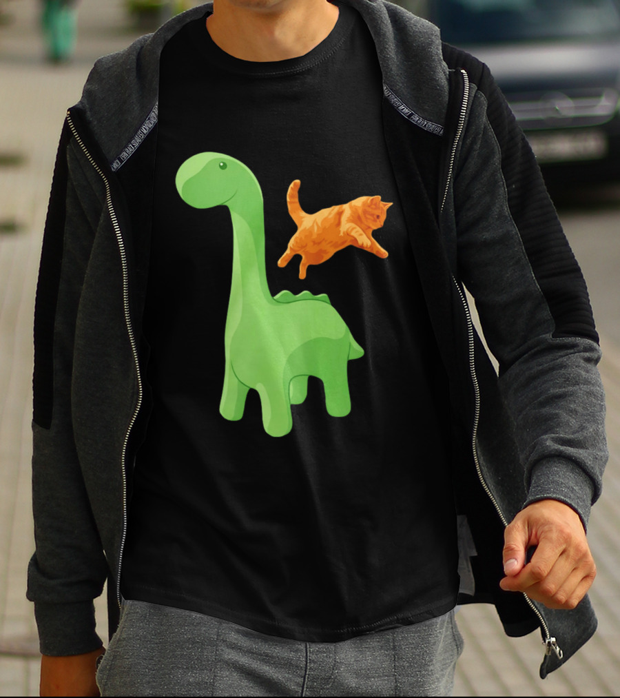 Cat Jumping Over Green Dinosaur Cartoon Image T-Shirt