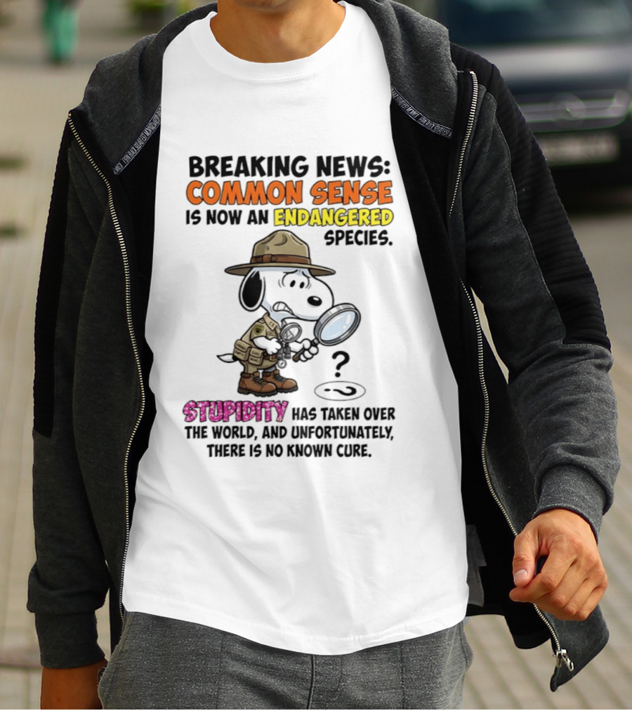 Breaking News Common Sense Endangered Species Stupidity Taken Over Snoopy T-Shirt