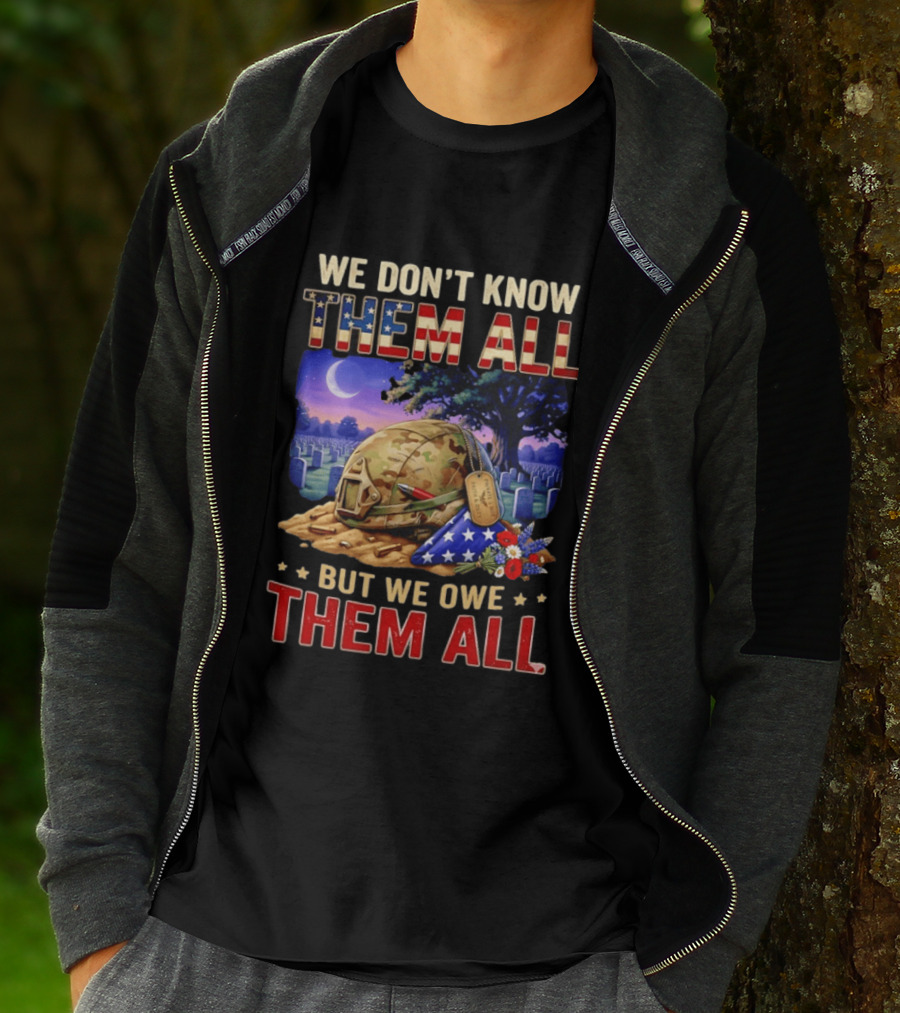 We Don't Know Them All But We Owe Them All Military Memorial Helmet And Flag Gravesite Scene T-Shirt