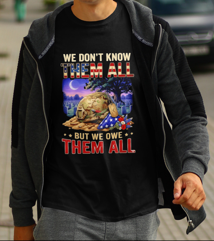 We Don't Know Them All But We Owe Them All Military Memorial Helmet And Flag Gravesite Scene T-Shirt