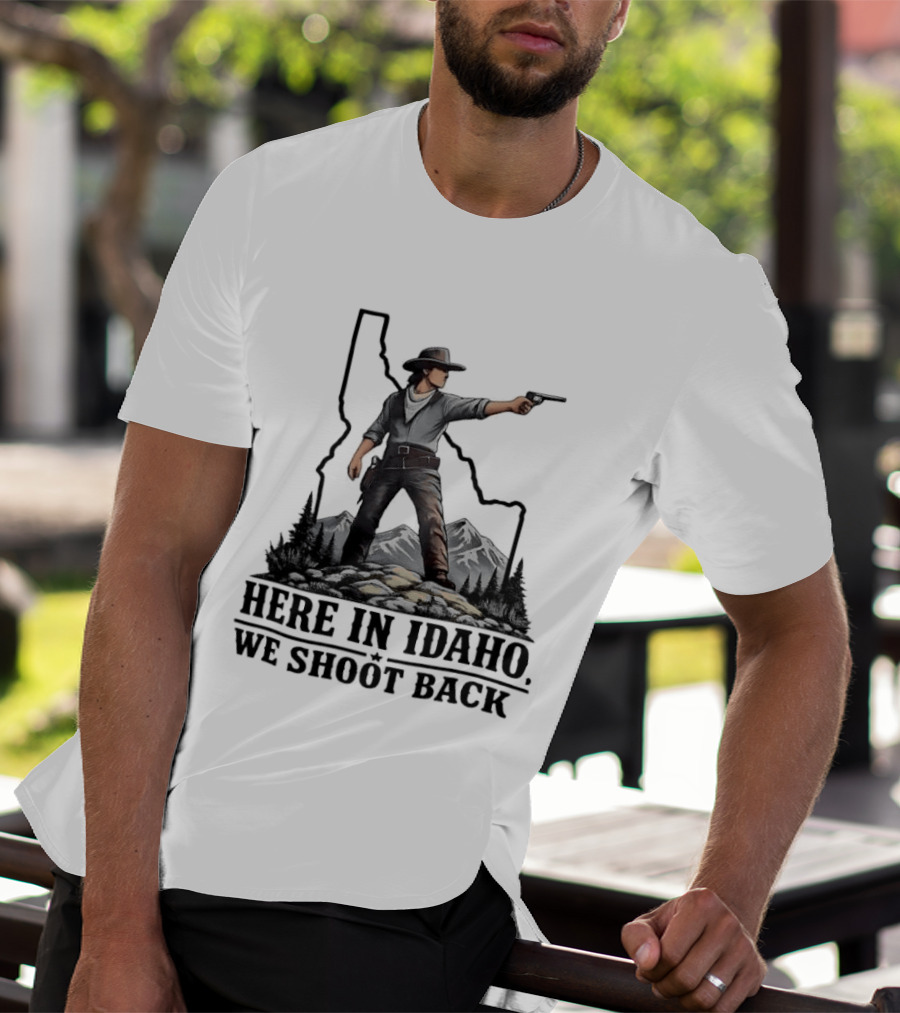 Here In Idaho We Shoot Back Cowboy With Pistol In State Mountains Scene T-Shirt