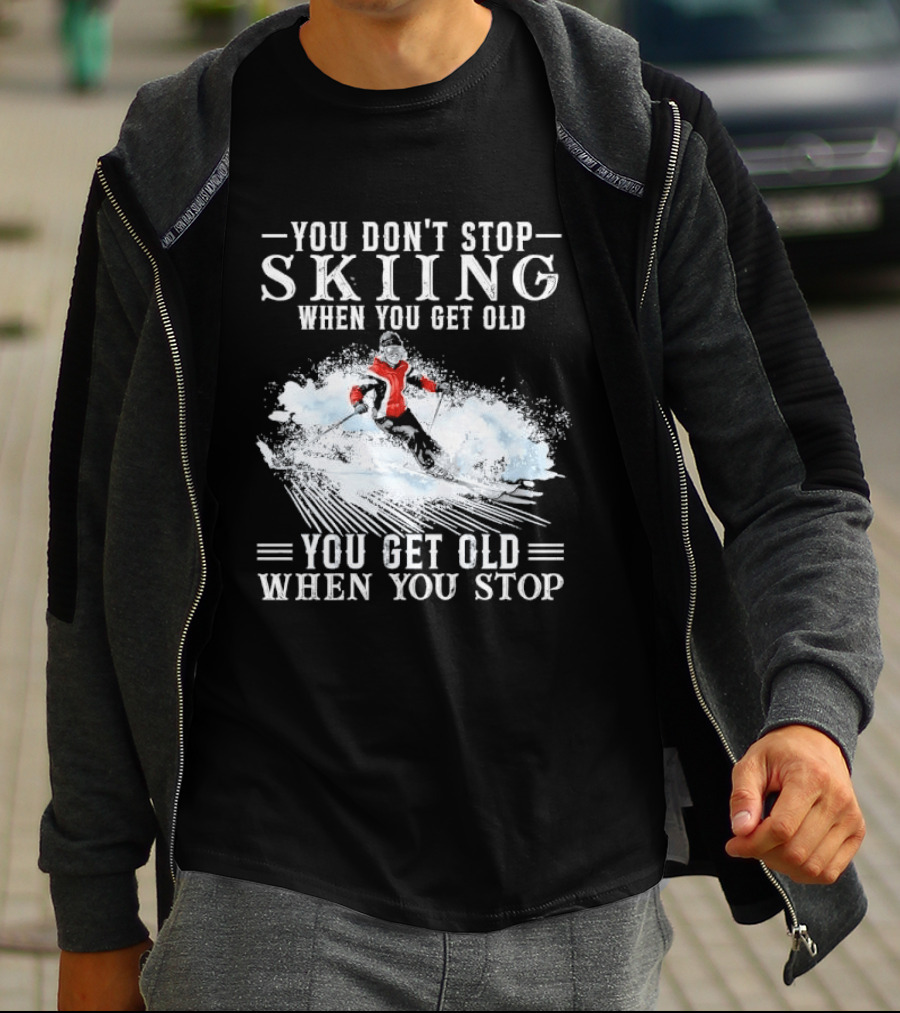 You Don't Stop Skiing When You Get Old You Get Old When You Stop Older Woman Skier Spraying Snow T-Shirt