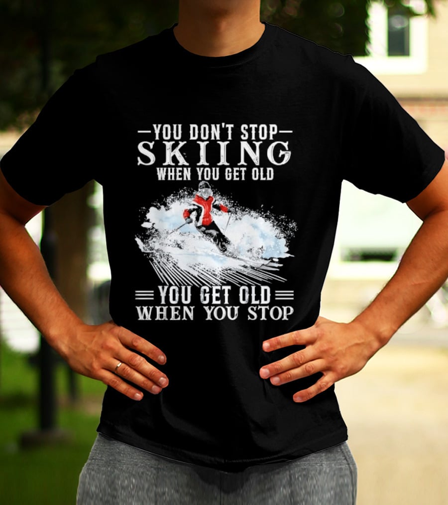 You Don't Stop Skiing When You Get Old You Get Old When You Stop Older Woman Skier Spraying Snow T-Shirt