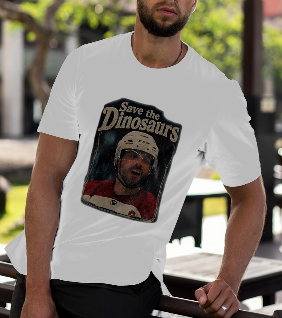 Connor Storrie Wearing Scott Hunter Save The Dinosaurs CCM Hockey T-Shirt