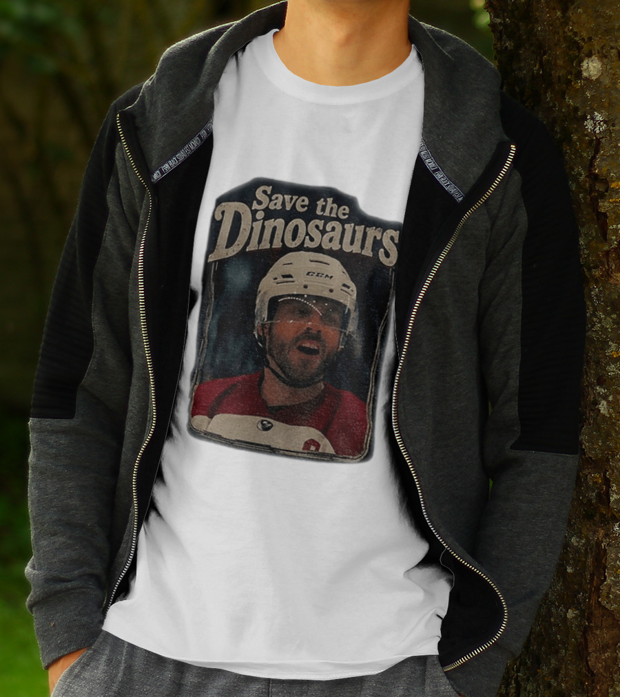 Connor Storrie Wearing Scott Hunter Save The Dinosaurs CCM Hockey T-Shirt