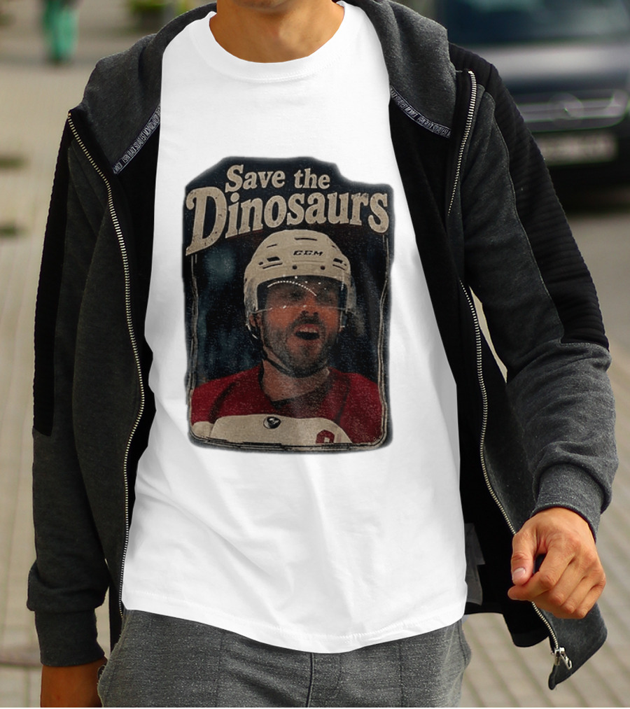 Connor Storrie Wearing Scott Hunter Save The Dinosaurs CCM Hockey T-Shirt