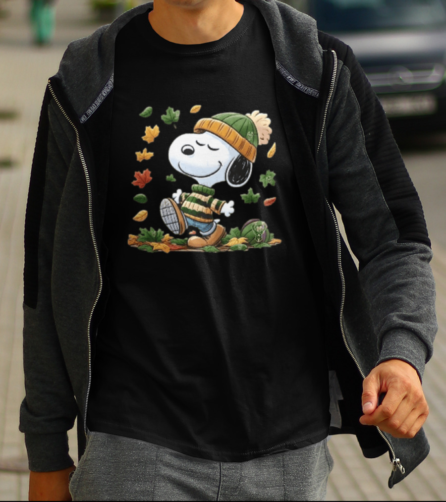 Milwaukee Bucks Snoopy In Beanie Walking Through Autumn Leaves Cartoon T-Shirt