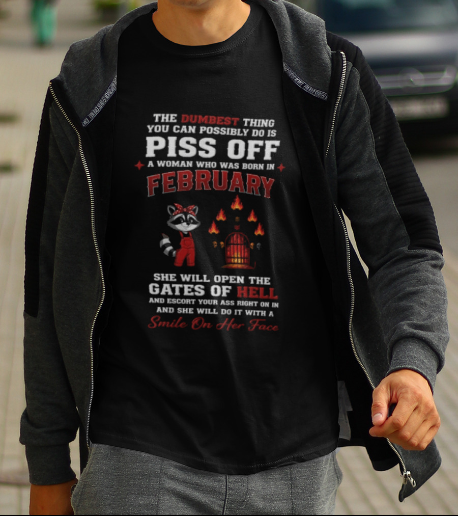 The Dumbest Thing You Can Possibly Do Is Piss Off A Woman Born In February Raccoon Gates Of Hell With A Smile On Her Face T-Shirt