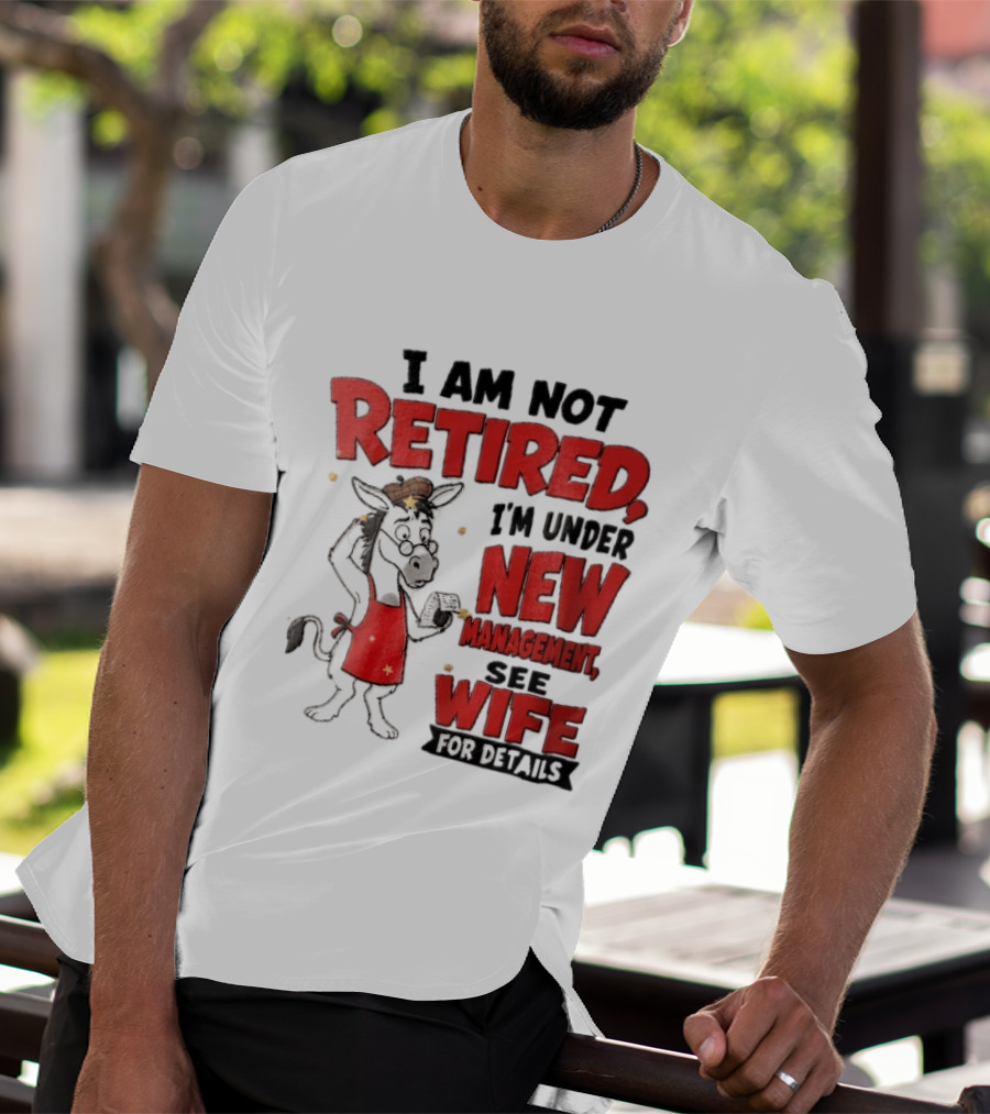 I Am Not Retired I'm Under New Management See Wife For Details Cartoon Donkey Red Apron T-Shirt