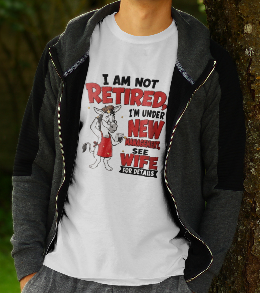 I Am Not Retired I'm Under New Management See Wife For Details Cartoon Donkey Red Apron T-Shirt